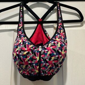 Victorias Secret -VSX Sport- Multi-Color Sports Bra. Size 36C. Front zip.